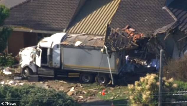 Footage from the scene showed the truck after crashing into a meadow, crashing into a fence and tumbling down the side of the house before the vehicle picked up part of the roof (pictured).