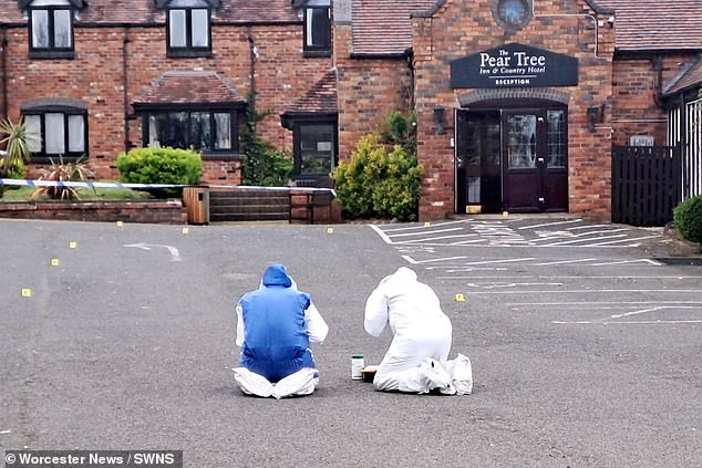 Police and forensic officers at the Pear Tree Inn & Country Hotel near Worcester on April 2, 2024