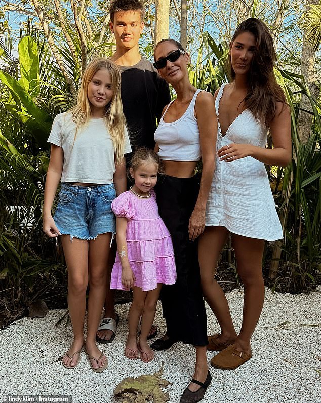 Speculation about a breakup arose this week when Lindy, 45, posed for a portrait with her four children without Ellis. After posting the image on Instagram, eagle-eyed followers noticed that the real-life Balinese princess was no longer wearing her engagement ring. (Pictured)