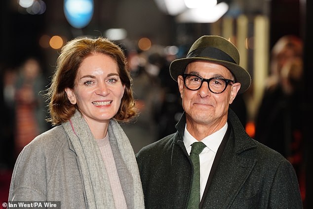 The couple appeared in high spirits as they posed for photos on the red carpet.