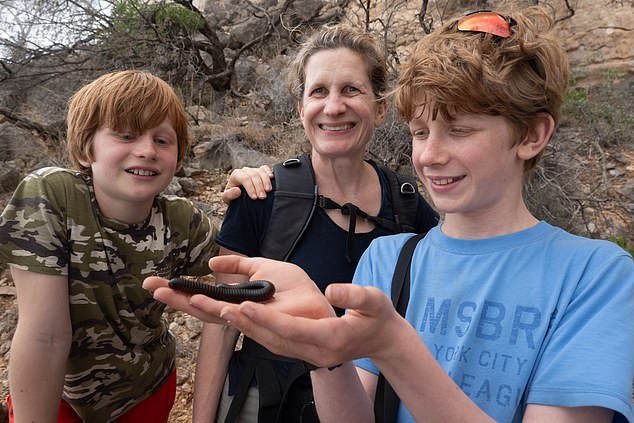 Kate with her sons Zac and Archie at Samhan Nature Reserve, while Zac examines a millipede