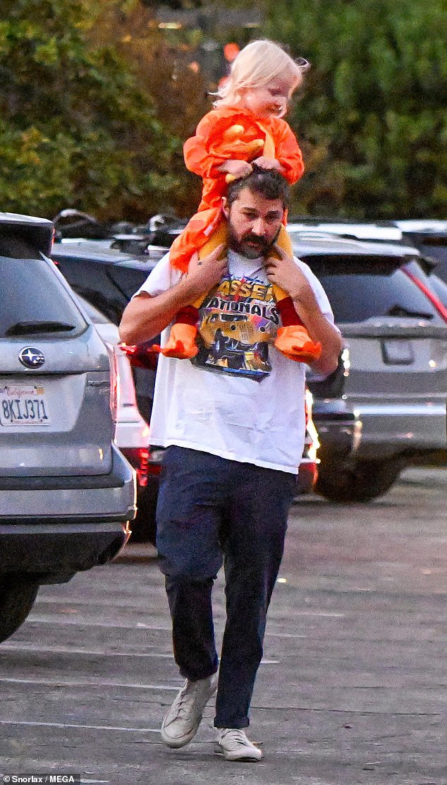 On Thursday, the couple was seen arriving at the botanical garden, which hosts an annual event, called Carved, where visitors can explore a mile-long trail filled with pumpkins, lanterns and other Halloween-themed decorations.