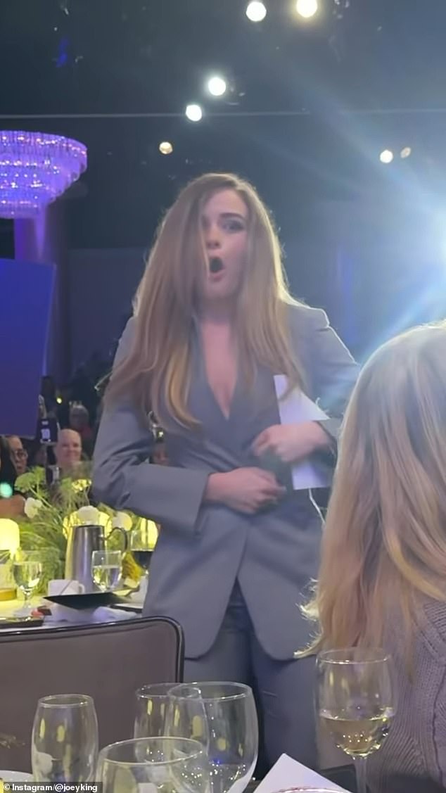 While heading to the stage at the Beverly Hilton Hotel in Los Angeles, the 25-year-old actress's jacket burst open, leaving her struggling to keep it closed.