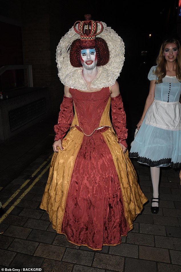 Comedian and TV presenter Joel Dommet made sure to be the center of attention as he arrived at the party dressed as Queen Elizabeth I with his face painted.