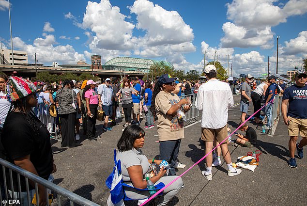 Lines for Kamala Harris' rally in Houston stretched through the parking lot as people dressed in Harris-Walz gear waited for hours to get inside.