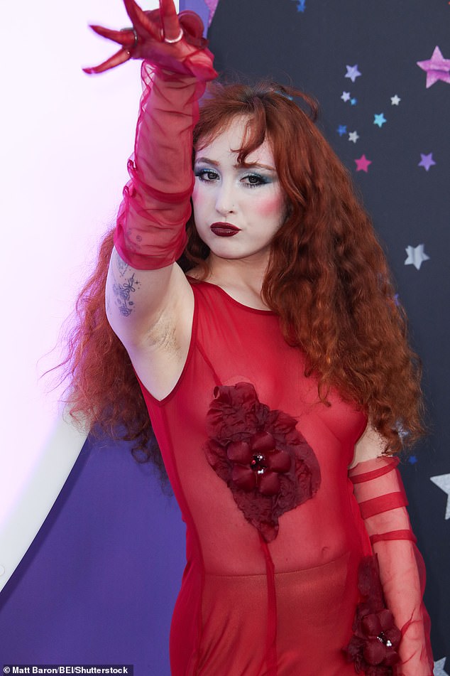 With her exaggerated makeup and dramatic poses, Chappell was a must-see as she stalked the red carpet during the premiere.