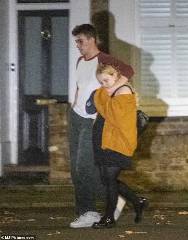 Nicola was seen snuggling up to Renegade star Nell as they walked home together.