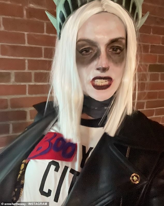 On Friday, she modeled a unique Lady Liberty costume, which included a DIY 'Boo York City' t-shirt, a short bleach blonde wig, and the monument's crown.