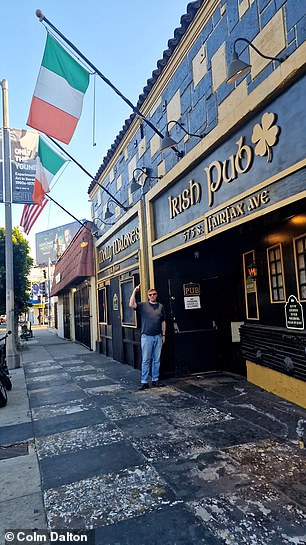 Molly Malone's is the most common name for an Irish pub, says Colm. He is pictured above at Molly Malone's in California.