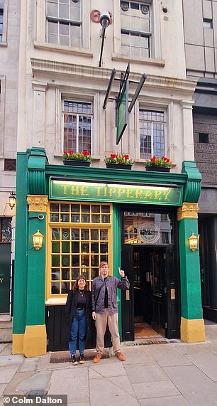 Colm takes his partner on his missions. They are photographed here at The Tipperary Irish pub in London.