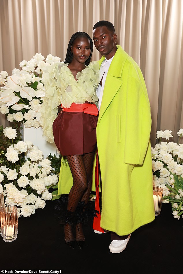 Adut Akech and Samuel Elkhier at a Vogue fashion event in 2022