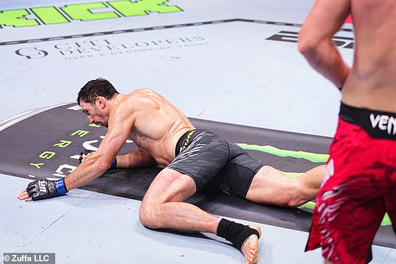 ABU DHABI, UNITED ARAB EMIRATES - OCTOBER 26: Shara Magomedov of Russia knocks out Armen Petrosyan of Russia in a middleweight fight during the UFC 308 event at Etihad Arena on October 26, 2024 in Abu Dhabi, United Arab Emirates. (Photo by Chris Unger/Zuffa LLC)