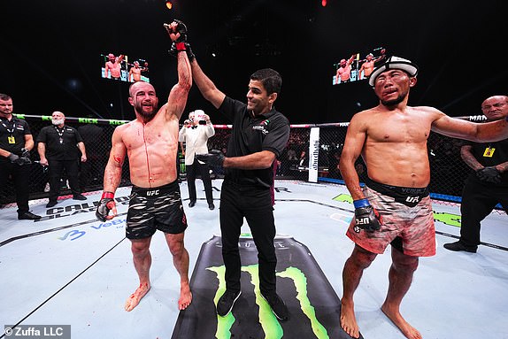 ABU DHABI, UNITED ARAB EMIRATES – OCTOBER 26: Mateusz Rebecki of Poland reacts after a split decision victory against Myktybek Orolbai of Kyrgyzstan in a 160-pound catchweight bout during the UFC 308 event at Etihad Arena on October 26, 2024 in Abu Dhabi. United Arab Emirates. (Photo by Chris Unger/Zuffa LLC)