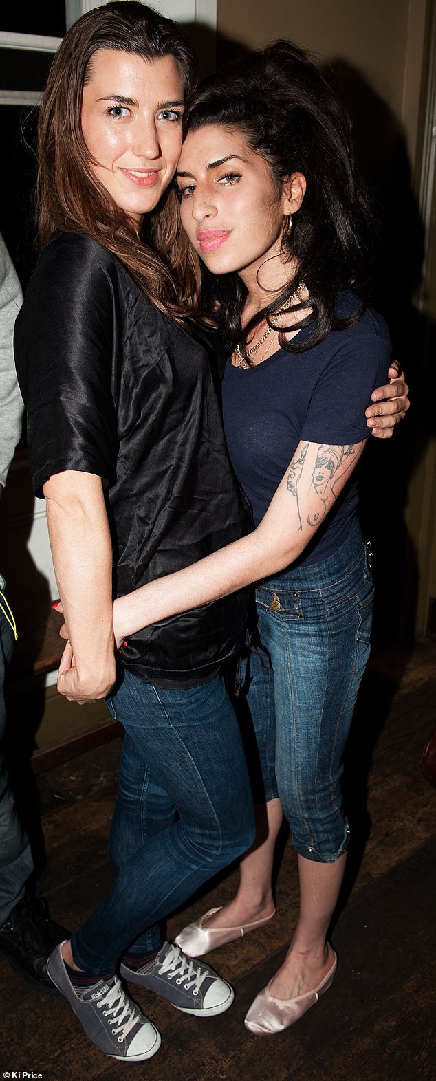 Isabelle Thomas, who committed suicide on Monday, is pictured with Amy Winehouse at a party in London in 2010. Winehouse died of an accidental overdose in July 2011, aged 27.