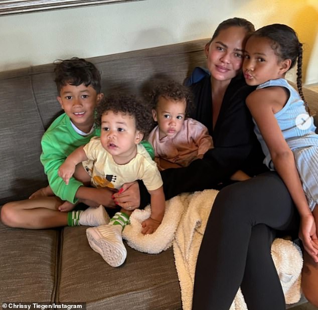 Chrissy and John share Luna, Miles, Esti and Wren, who was born via surrogate in June 2023.