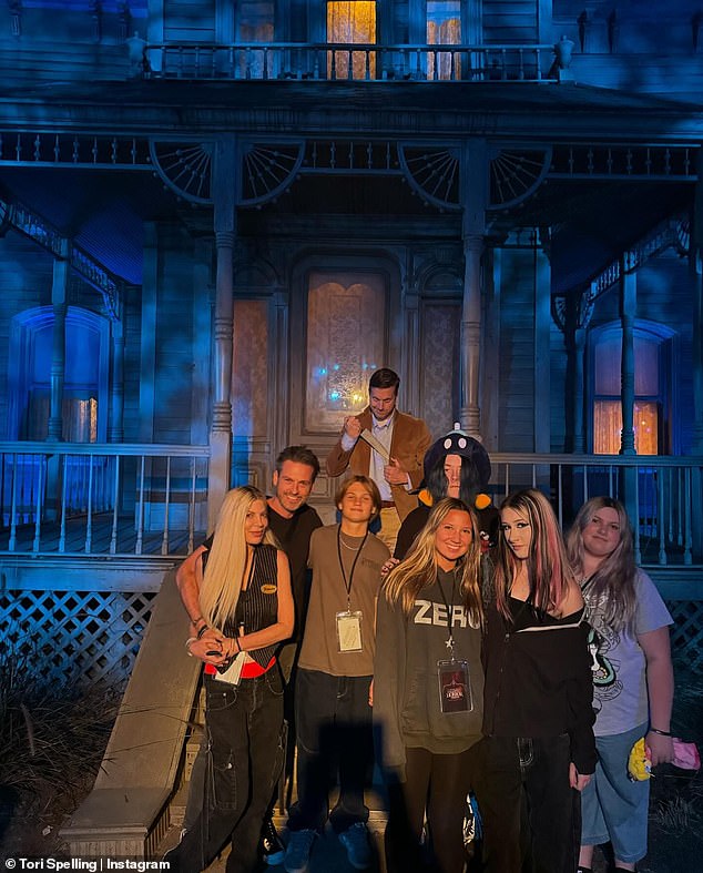 Tori, Liam, 17, Stella, 16, Hattie, 13, Finn, 12, and Beau, five, enjoyed joking around with ghouls and ghosts and posing in front of haunted houses.