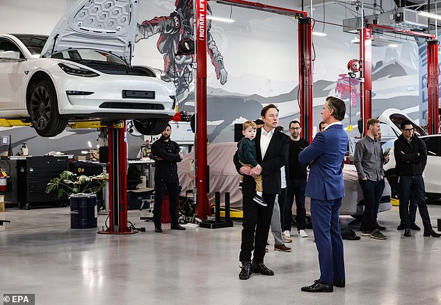 Tesla CEO Elon Musk and California Governor Gavin Newsom during a tour of the Palo Alto headquarters in February 2023.