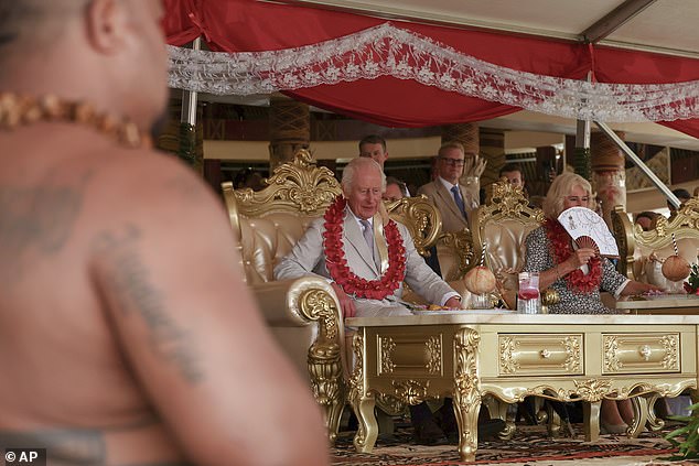 The king was honored with the primary title of To'aiga-O-Tumua by the high chief of the village, while he and Camilla received sacred kava in coconut shells with straws.