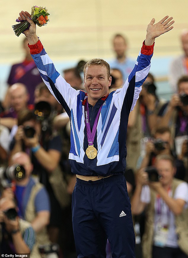 Sir Chris Hoy celebrates on the podium after winning gold medal at London 2012