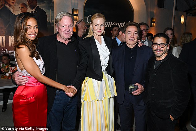 Later that night, the star dressed in a black tuxedo jacket while posing for photos (seen with Zoe Saldana, her friend Ron Burkle, agent Kevin Huvane and executive producer David Glasser).