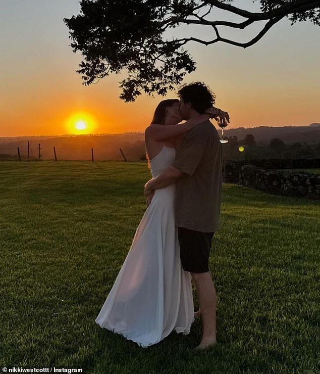 The couple looked very much in love as they shared a romantic kiss in front of the sunset just hours before their wedding.