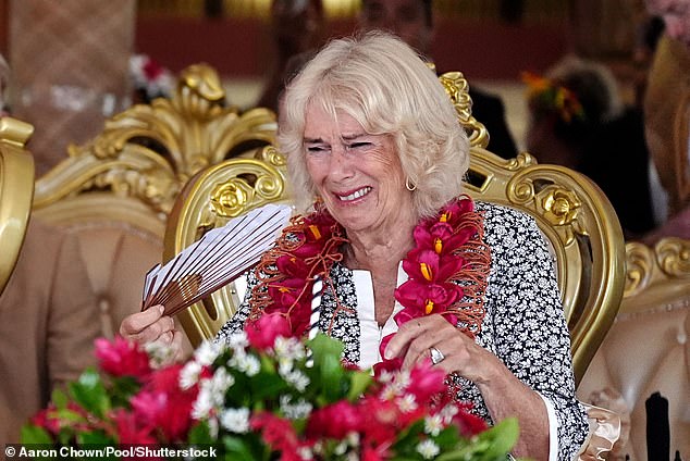 Queen Camilla laughing during a farewell ceremony at Siumu Village on the final day of the royal visit to Australia and Samoa.