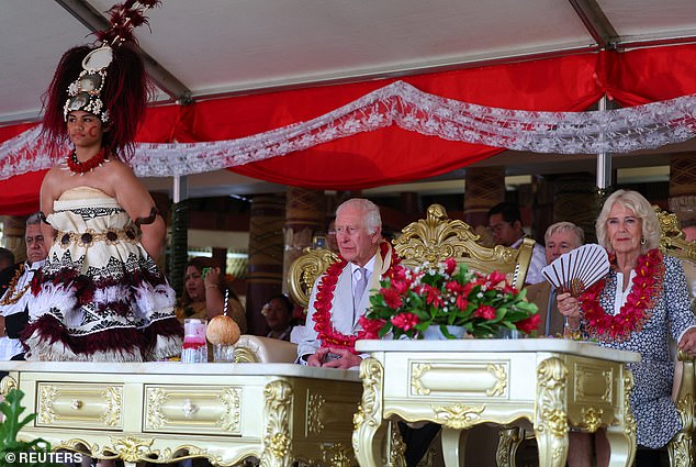 Britain's King Charles and Queen Camilla attend a ceremony at Siumu Village on October 26.