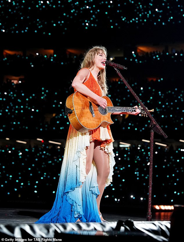 Her surprise new outfit was short in the front and featured a long train as she twirled around the stage, serenading her 83,000 screaming fans at Caesars Superdome.