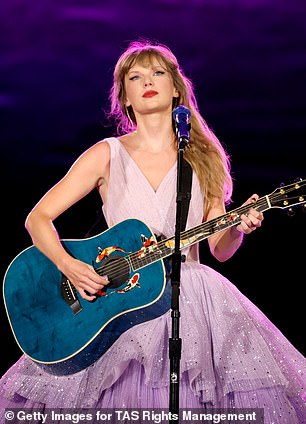 Online fans immediately compared her new dress to a blue guitar she used during the Speak Now world tour in 2011 that had three orange fish around the mouth; seen in 2023