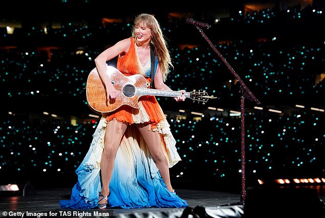 Taylor also debuted a stunning new koi fish-inspired dress during her surprise song on Saturday night.