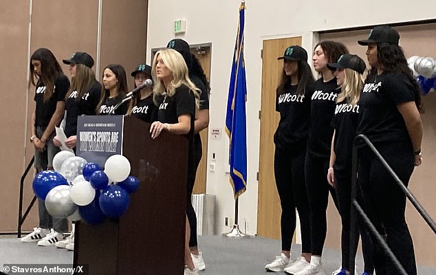 At a press conference, the captain tearfully criticized the university for ignoring the team's concerns about sharing the court with a transgender athlete.