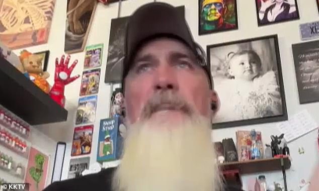 David Brown, owner of Fallen Heroes Tattoo & Piercing in Colorado Springs, said he was forced to do the mural after the apartment complex towed his customers' cars.