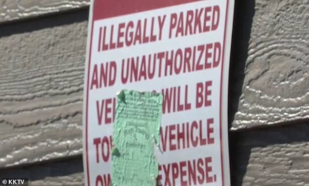 The owners of the complex posted a sign in front of their building notifying drivers that the spots in the alley are private parking lots.