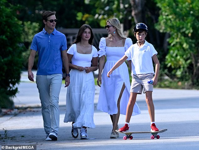 Joseph walked around on a skateboard, sensibly sporting a helmet along with a white polo shirt, gray shorts, and bright red sneakers.