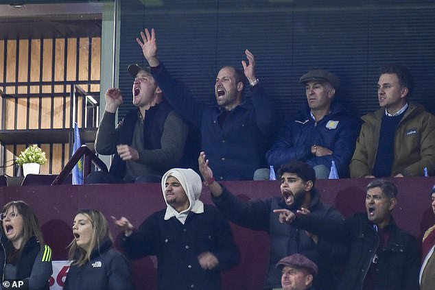 Prince William, second from the left in the back row, is not afraid to let loose during the opening Champions League match between his team Aston Villa and Bayern Munich earlier this month.