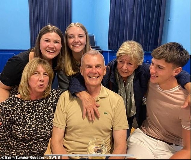 Mom Joanne (bottom left), sister Harriet (top right), girlfriend Caitlin (top center), dad John (bottom center), grandmother Jennifer (second right), Isaac (right)