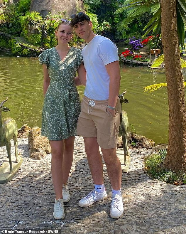 Isaac (pictured with his girlfriend Caitlin) was diagnosed with grade 4 glioblastoma (GMB), an aggressive cancer, and underwent chemotherapy and radiotherapy.