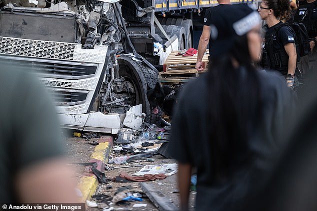 A view of the area as medical teams respond to dozens of people at the scene after a truck crashed into a bus stop, north of Tel Aviv, Israel, on October 27, 2024.