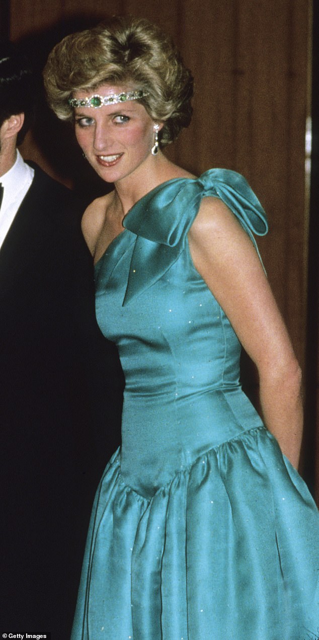 Princess Diana wearing a green satin evening dress designed by David and Elizabeth Emanuel