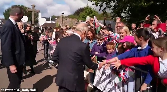 A man leaned forward and shouted, 'Charles! While we struggle to heat our homes, we have to pay for your parade'