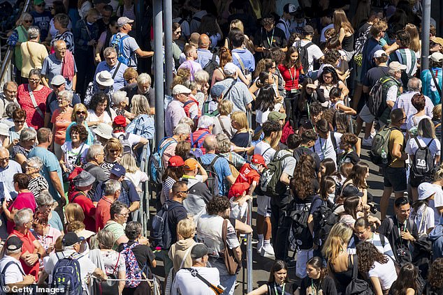 Tourists swarm London (pictured). Greenland is expected to become a hot tourist spot as Americans flock to the island.