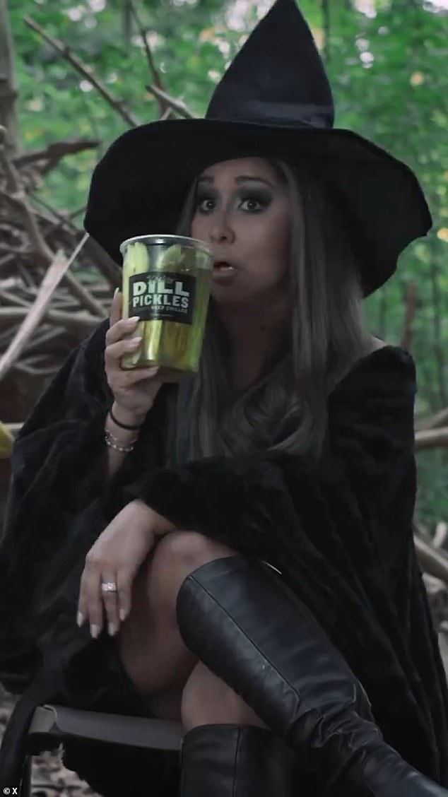 Nicole 'Snooki' Polizzi as the 'Pickle Witch' in the Jimmy John promo, breaking the news. The pickle-loving star drank pickle juice in the video (pictured)