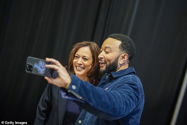 Kamala Harris takes a selfie with John Legend before her Philadelphia rally