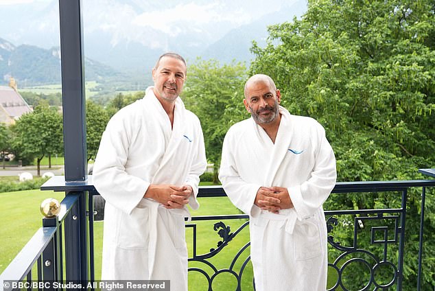 Paddy McGuinness (left) and Chris Harris (right) stop off on their road trip and pose in their bathrobes on a balcony at the five-star Grand Resort Bad Ragaz hotel in Switzerland.