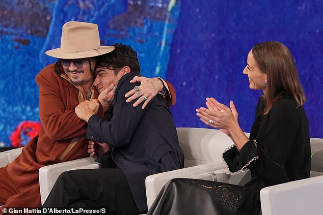 Depp appeared on the Italian talk show Che Tempo Che Fa in Milan on Sunday to promote his second directorial effort, Modì, Three Days on the Wing of Madness, alongside his cast members Riccardo Scamarcio (right) and Antonia Desplat ( right).