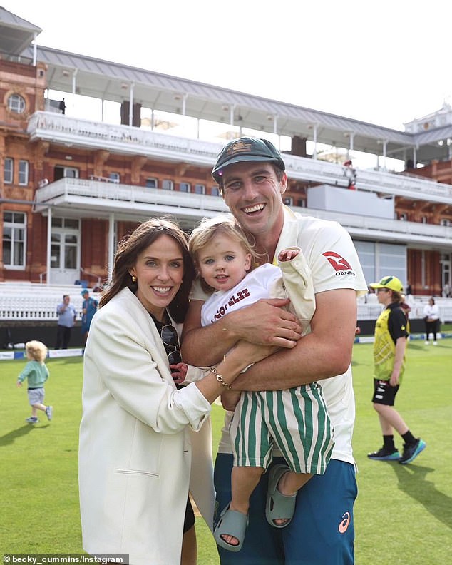 Cummins (pictured with wife Becky and son Albie) came under fire after reports that players were unhappy with Langer's intense coaching style.