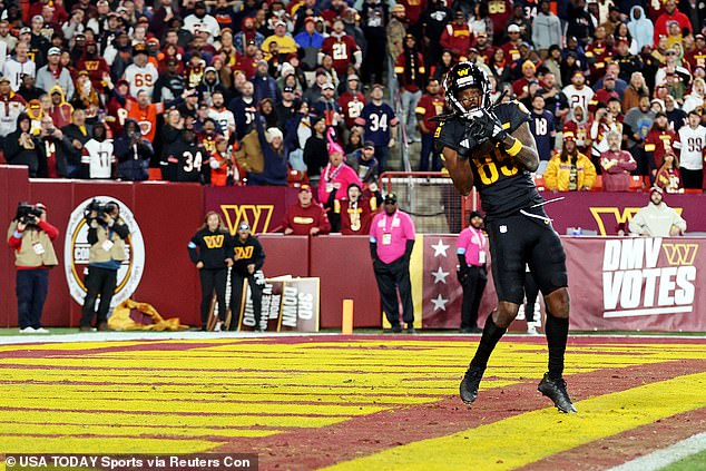 Jayden Daniels threw a 52-yard Hail Mary winner to Noah Brown (pictured)