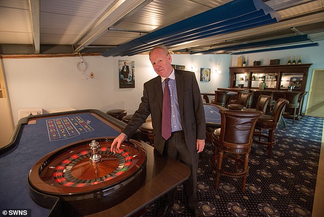 Mr. Wildin's man cave also included a casino with roulette and its own bar.