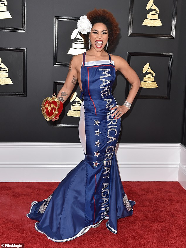 Soriano has designed stunning, MAGA-friendly couture for songwriters Joy Villa (pictured) and Ricky Rebel at the Grammy Awards.