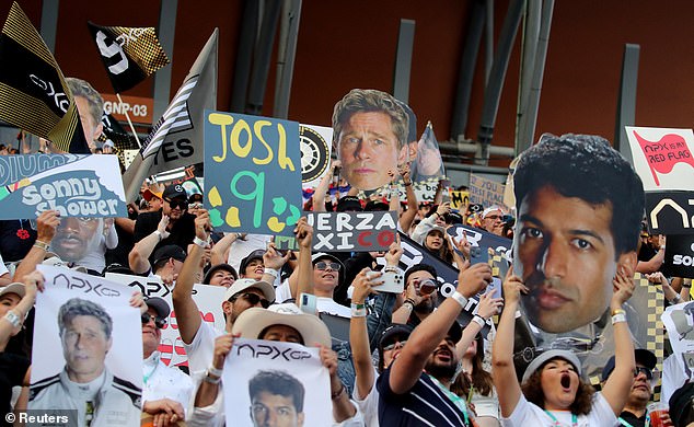 Spectators held cardboard cutouts of Brad as they cheered on his fictional Apex Grand Prix team.